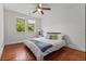 Bedroom featuring hardwood floors, natural light, and a ceiling fan at 17 8Th Ave # 17G, Charleston, SC 29403