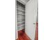Bedroom closet with white shelving providing ample storage space at 17 8Th Ave # 17G, Charleston, SC 29403