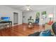 Bright living room with hardwood floors and modern furnishings, perfect for relaxing or entertaining at 17 8Th Ave # 17G, Charleston, SC 29403