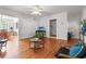Open living room showing hardwood floors, comfortable seating, stylish decor, and bright, airy atmosphere at 17 8Th Ave # 17G, Charleston, SC 29403