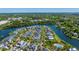Scenic aerial shot of a lakeside community with a mix of housing and beautiful water views and nature all around at 1700 Paradise Lake Dr, Mount Pleasant, SC 29464