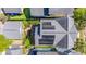 Aerial view showing solar panels on the roof with an outdoor seating area and garden, providing sustainability and relaxation at 1700 Paradise Lake Dr, Mount Pleasant, SC 29464
