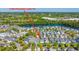 Aerial view of 1700 Paradise Lake Dr showcasing the property within a lakeside community setting with an arrow pointer at 1700 Paradise Lake Dr, Mount Pleasant, SC 29464