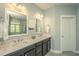 Well-appointed bathroom featuring dual sinks, modern fixtures, and a vanity with ample counter space for convenience at 1700 Paradise Lake Dr, Mount Pleasant, SC 29464