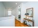 Hallway features hardwood flooring and stylish decor, leading to bedrooms or other living spaces at 1700 Paradise Lake Dr, Mount Pleasant, SC 29464