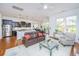 Bright open concept with kitchen, dinette and living room with hardwood floors at 1700 Paradise Lake Dr, Mount Pleasant, SC 29464