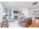 Bright living room with hardwood floors, fireplace and built-in shelving at 1700 Paradise Lake Dr, Mount Pleasant, SC 29464
