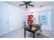 Bright office space featuring a work desk, red bookshelf, and a ceiling fan for added comfort at 1700 Paradise Lake Dr, Mount Pleasant, SC 29464