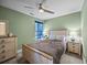 Relaxing bedroom with neutral walls, featuring a ceiling fan and natural light from the window at 187 Brittondale Rd, Summerville, SC 29485