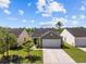 Charming single-Gathering home featuring a two-car garage and landscaped front yard, perfect for curb appeal at 187 Brittondale Rd, Summerville, SC 29485