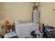 Functional laundry area with a washer, dryer, and water heater at 187 Brittondale Rd, Summerville, SC 29485