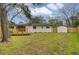 The backyard features a deck, a shed, a wood fence, and a lawn at 1897 Halo Ln, Charleston, SC 29407