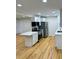 Bright kitchen features white cabinets, stainless steel appliances and an island at 1897 Halo Ln, Charleston, SC 29407