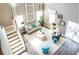 Bright living room with hardwood floors, neutral furniture, and large windows at 193 Belfort Pl, Summerville, SC 29486