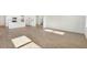 Open living space featuring hardwood floors, white walls, and recessed lighting, offering a spacious and airy atmosphere at 193 Belfort Pl, Summerville, SC 29486