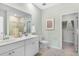 Bright bathroom featuring double sinks, a walk-in shower, and a closet for ample storage at 195 Belfort Pl, Summerville, SC 29486