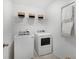 Clean laundry room with modern washer and dryer, wire rack, and drying rack at 195 Belfort Pl, Summerville, SC 29486