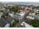 Aerial view showcases a residential neighborhood with views of the bridge and ocean at 2 Bedons Aly, Charleston, SC 29401