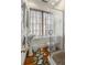 Bathroom featuring glass shower, pedestal sink, and a unique rug at 2 Bedons Aly, Charleston, SC 29401