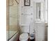 Bathroom featuring a shower, toilet, vanity with sink and tile flooring at 2 Bedons Aly, Charleston, SC 29401