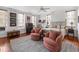 Bedroom featuring hardwood floors, two chairs, and an ornate metal bed frame at 2 Bedons Aly, Charleston, SC 29401