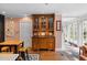 Charming dining area with a built-in hutch, table and access to the sunroom at 2 Bedons Aly, Charleston, SC 29401