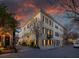 Stunning three-story building boasting classic architectural details and charming shutters at 2 Bedons Aly, Charleston, SC 29401