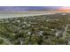 Aerial view of a coastal community, featuring many homes and the beach at 2 Wills Way, Isle of Palms, SC 29451
