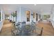 Spacious covered porch featuring stylish outdoor furniture and a relaxing atmosphere at 2 Wills Way, Isle of Palms, SC 29451