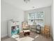 Bedroom features natural light, neutral walls, carpet, and desk at 202 Kirkland St, Goose Creek, SC 29445