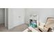 Bedroom featuring storage, neutral walls, carpet, and chair at 202 Kirkland St, Goose Creek, SC 29445