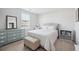 Bright bedroom with a bed, side tables, storage, and a large window at 202 Kirkland St, Goose Creek, SC 29445