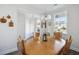 Inviting dining room with hardwood floors, decorative wall accents, and ample natural light at 202 Kirkland St, Goose Creek, SC 29445