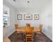 Cozy dining room features hardwood floors, natural light, and classic decor at 202 Kirkland St, Goose Creek, SC 29445