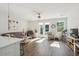 Bright living room featuring hardwood floors, neutral walls, and lots of natural light at 202 Kirkland St, Goose Creek, SC 29445