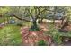 Expansive backyard boasting mature trees, a garden bench, and a storage shed at 2111 Nicholas David Path, Johns Island, SC 29455