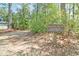 Private driveway with mature trees and Waterloo Estates sign at 2111 Nicholas David Path, Johns Island, SC 29455