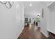 Hallway with hardwood floors leading to the living room at 2111 Nicholas David Path, Johns Island, SC 29455
