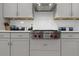 New Kitchen featuring a stainless steel stove and modern white tile backsplash at 2111 Nicholas David Path, Johns Island, SC 29455