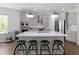 Elegant kitchen with stainless steel appliances, quartz countertops, and a large island at 2111 Nicholas David Path, Johns Island, SC 29455