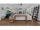 Spacious living room with hardwood floors, built in shelves and comfortable seating at 2111 Nicholas David Path, Johns Island, SC 29455