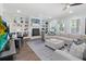 Inviting living room with built-in shelving, fireplace, and comfortable seating area at 2111 Nicholas David Path, Johns Island, SC 29455