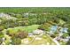Aerial shot showcasing a golf course and community nestled among lush green trees and well-maintained landscaping at 225 Silverwood Ln, Summerville, SC 29485