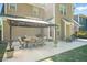 Inviting backyard featuring a covered patio with dining set, perfect for outdoor entertaining and relaxation at 225 Silverwood Ln, Summerville, SC 29485