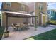 Inviting backyard featuring a covered patio with dining set, perfect for outdoor entertaining and relaxation at 225 Silverwood Ln, Summerville, SC 29485