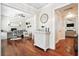 Open-concept living area with hardwood floors, neutral colors, and seamless flow to an office space at 225 Silverwood Ln, Summerville, SC 29485