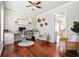Bright office space featuring hardwood floors, neutral paint, a ceiling fan, and natural light at 225 Silverwood Ln, Summerville, SC 29485