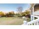 Backyard featuring a small greenhouse and a view of the home's screened in porch at 2312 Rushland Landing Rd, Johns Island, SC 29455
