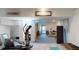 View of unfinished basement area featuring painted walls, access to storage, and workout equipment at 2312 Rushland Landing Rd, Johns Island, SC 29455