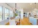 Bright dining space with large windows, hardwood floors, and an open layout, perfect for entertaining at 2312 Rushland Landing Rd, Johns Island, SC 29455